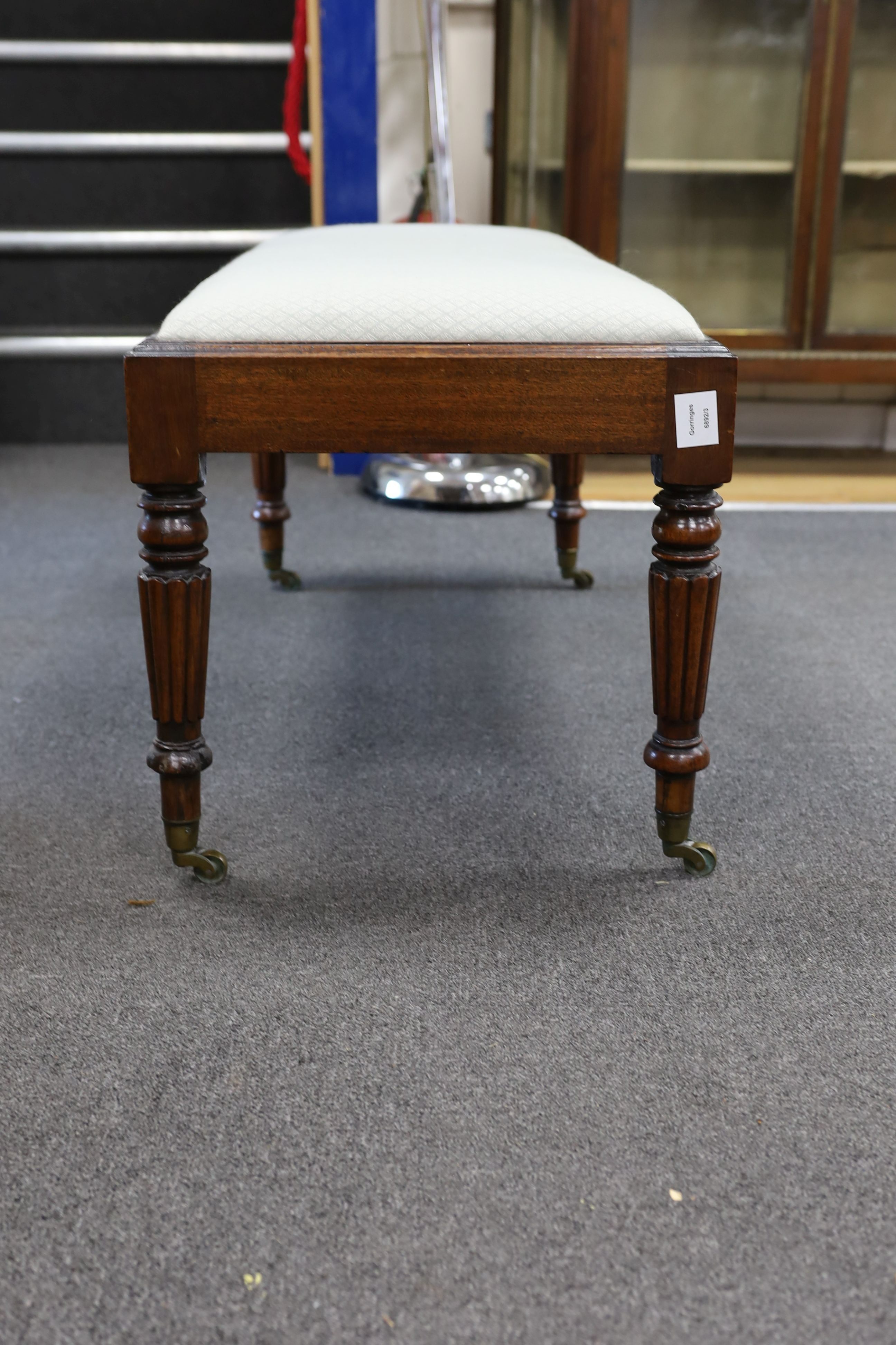 A Regency rectangular mahogany dressing stool, length 96cm, depth 46cm, height 46cm